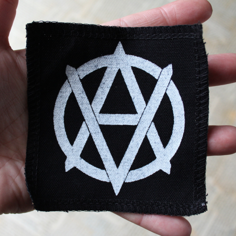 Veganism and anarchism - small fabric badge